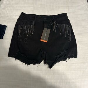 Chic Black Distressed Jean Shorts with Fringe by Risen Los Angeles